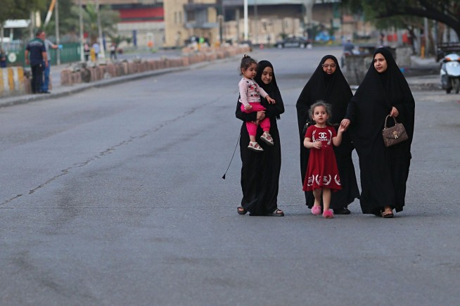 The Latest: China reports 36 new COVID-19 cases