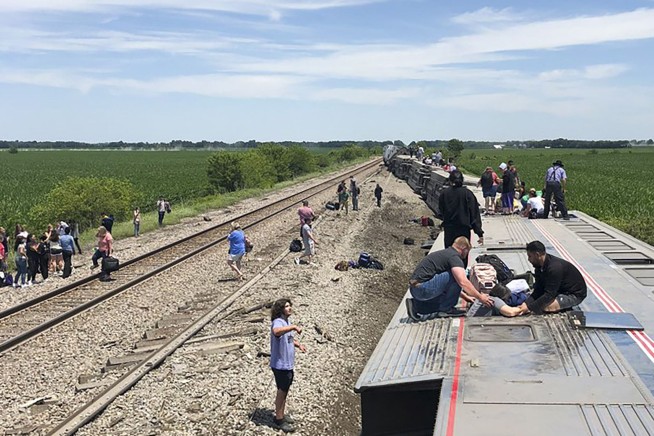 3 killed, dozens injured in truck-train crash in Missouri