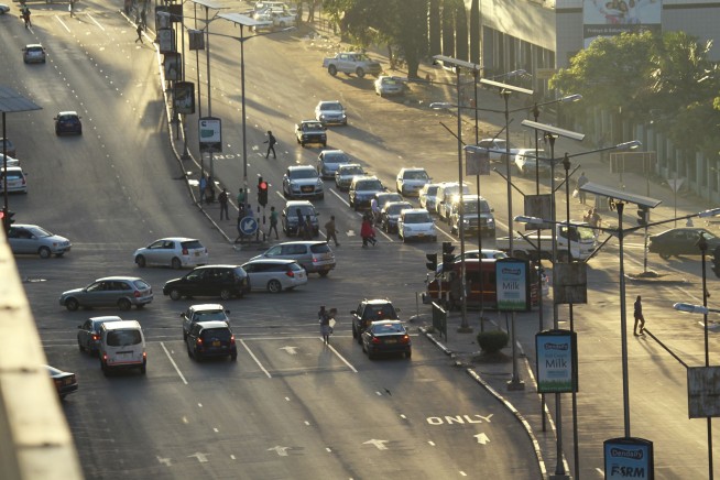 Zimbabwe calm but tense as Mugabe is urged to go peacefully