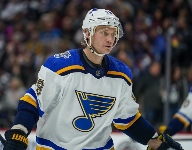 Blues' Bouwmeester remains hospitalized after bench collapse