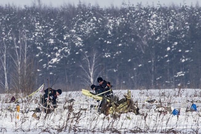 Workers find both data recorders at Russian plane crash site