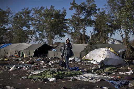 The Latest: A woman and 2 children drown off Greek island