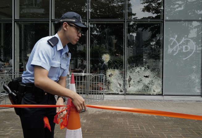 China backs Hong Kong chief, slams protesters for violence