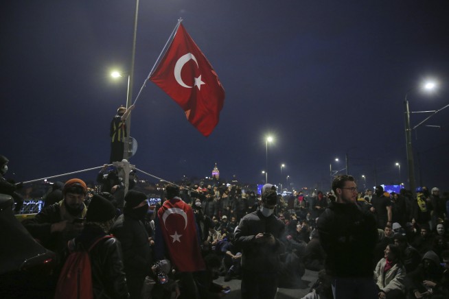 Turkey detains journalists as protests grow over the jailing of key Erdogan rival