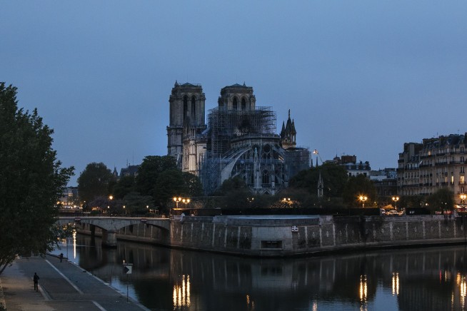 The Latest: LVMH chief pledges 200 million for Notre Dame