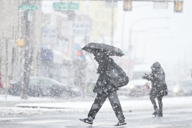Quick-moving winter storm brings snow to Northeast, disrupting travel and schools
