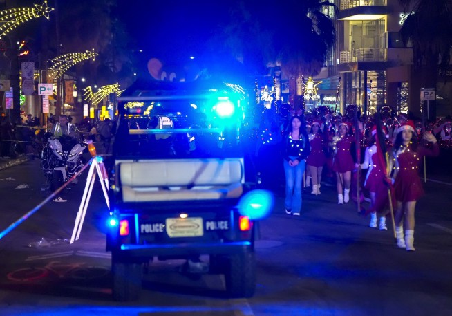 10 injured after police traffic officer on a motorcycle crashes into bystanders at California parade