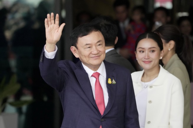 Former Thai leader Thaksin goes to jail as political party linked to him wins vote to take power