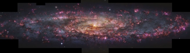 This photo of the nearby Sculptor galaxy spans 65,000 light years
