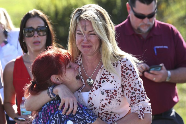 The Latest: Florida school shooting suspect booked in jail