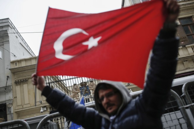 The Latest: Erdogan calls for sanctions on Netherlands
