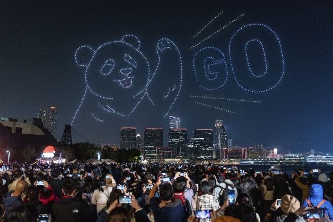 Hundreds gathered in Hong Kong for the city's first pyrotechnics drone show