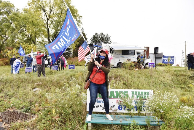 Surging coronavirus colors White House race in closing days