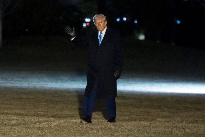 The Latest: Judge declines to halt Trump administration's federal workers layoffs