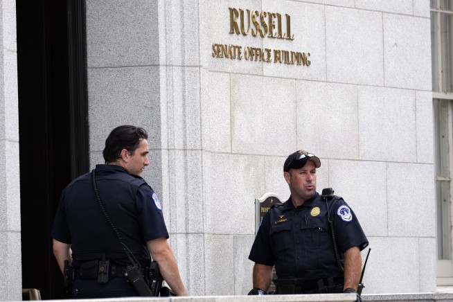 Police search Senate office buildings after report of active shooter; later declare it a false alarm