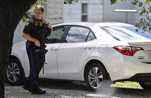 Police: Woman held in box for months found dead, man sought