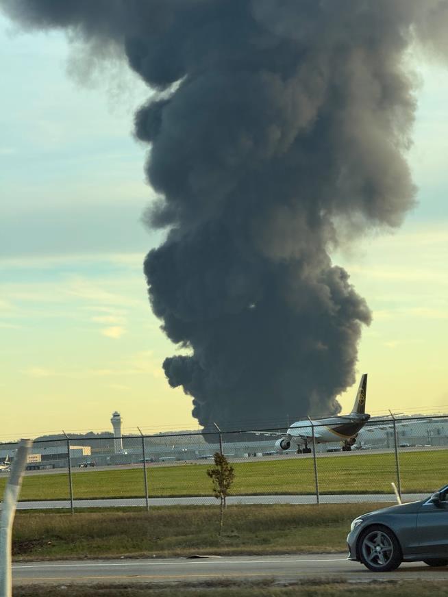 At least 7 dead, 11 injured in UPS plane crash and explosion at Kentucky airport