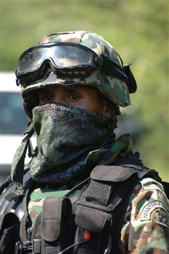 Mass grave found as Mexico probes town's violence