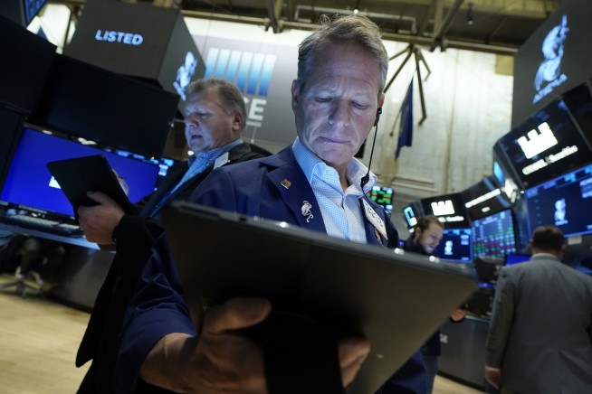 Major Wall Street stock indexes eke out more record highs