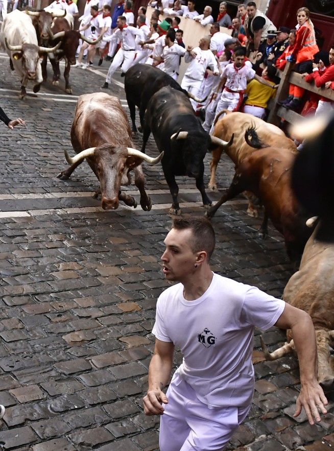 1st bull run in Pamplona in 3 years takes place; no gorings