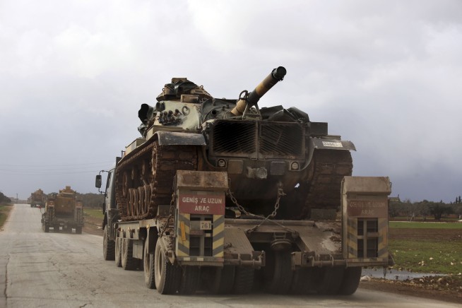 Syrian troops gain territory in push to control key highway