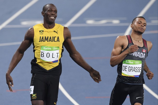 Bolt shines bright, wins another gold in Olympic 100