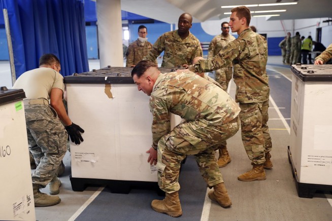 The Latest: US reaches daily high of nearly 228,000 cases