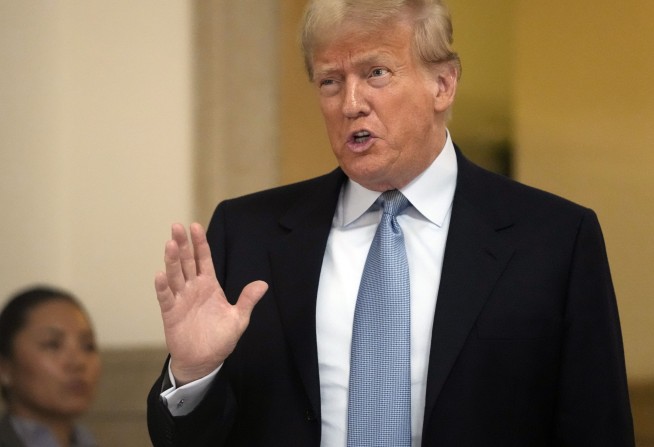 Woman arrested after trying to get close to Trump at New York trial; she says she's a supporter