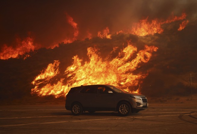 Over 50,000 under evacuation orders or warnings as wildfire imperils homes north of Los Angeles