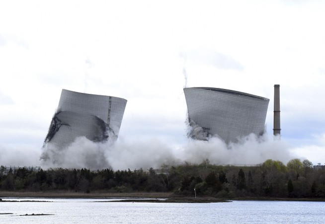 Poof, they're gone: Power plant towers demolished in seconds