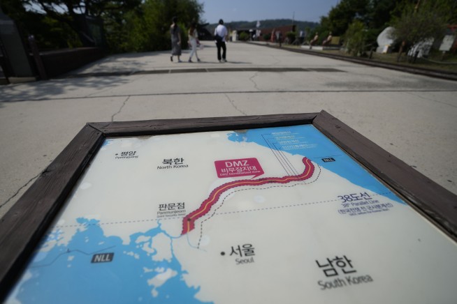 N. Korea shows off civil defense units in toned-down parade