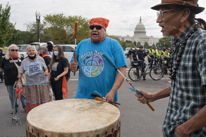 Climate activists resume weeklong protest at Capitol