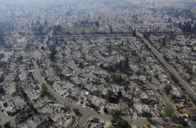 Deadly and vast California wildfires could gain momentum