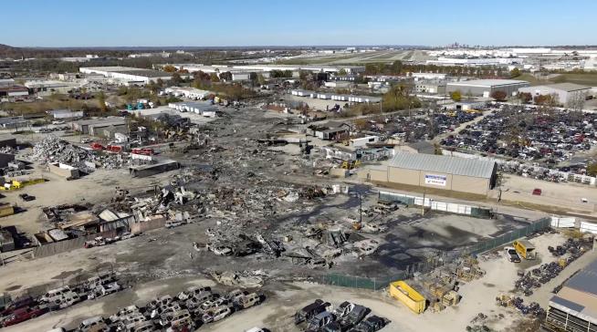 Dramatic photos of doomed UPS plane show the aircraft on fire and its engine flying off