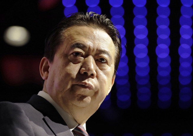 China says Interpol ex-president confesses to bribe taking