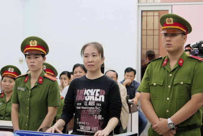 Vietnam frees popular blogger on condition she leave for US