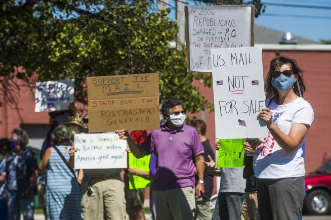 Postal Service halts some operational changes after outcry