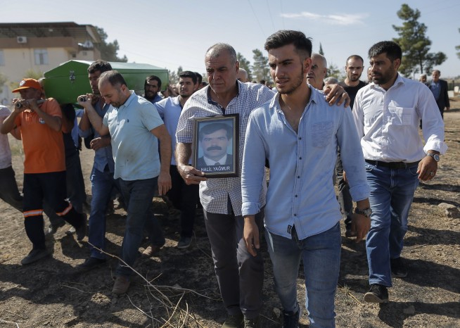 Turkish forces say they've captured key Syrian border town