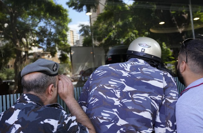 Woman with toy gun grabs trapped savings from Beirut bank