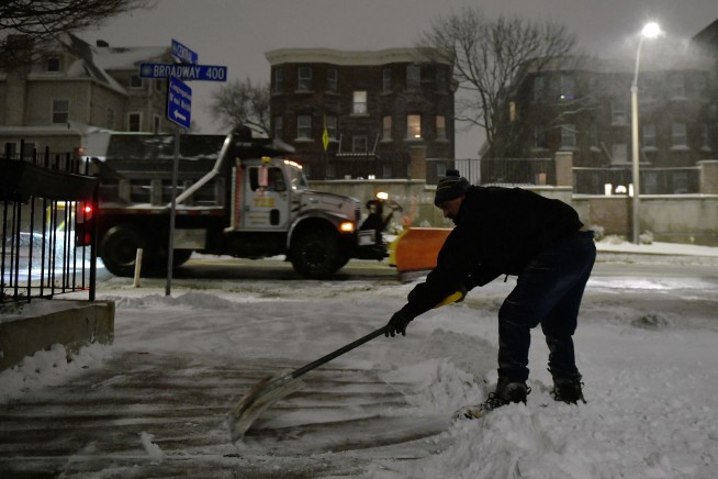 Winter storm churns up East Coast with deep snow, high winds