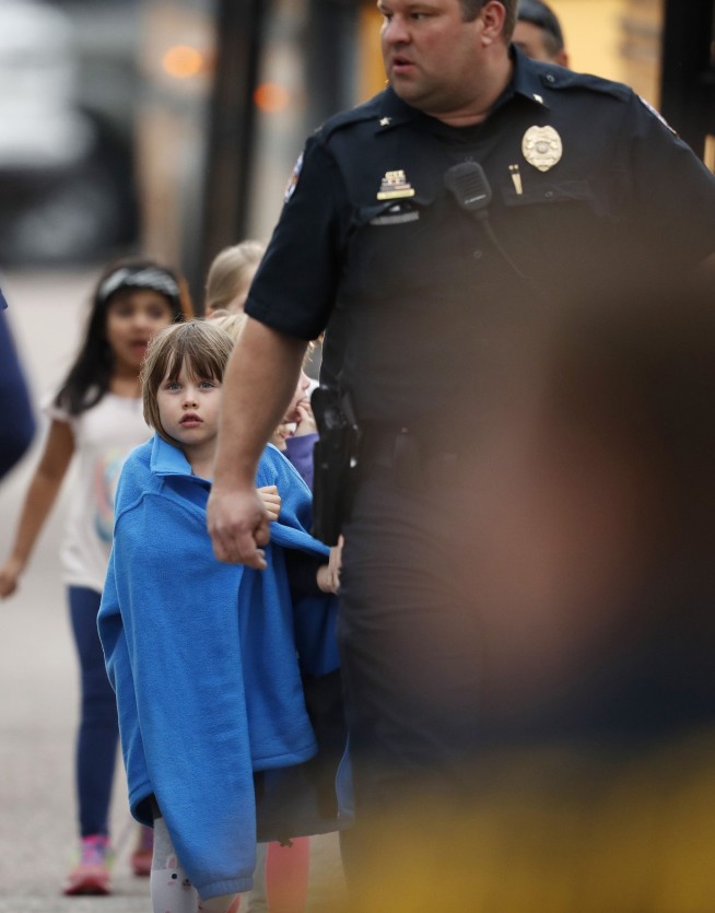 The Latest: 1 suspect in Colorado school shooting identified