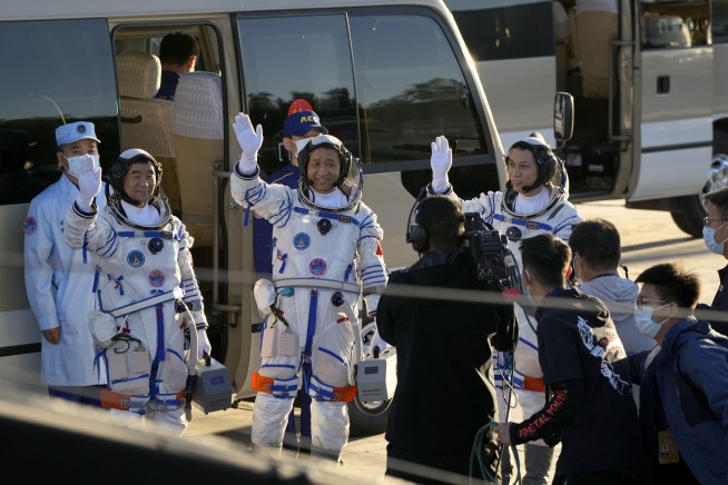 China launches first crew to live on new space station