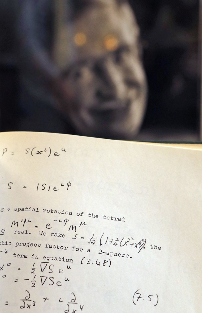 AP Exclusive: Stephen Hawking wheelchair, thesis up for sale