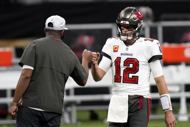 Column: Brady moves on, making history with every throw