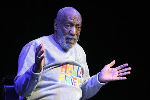 Crew removes graffiti on Cosby's Hollywood star