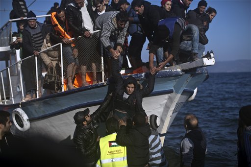 The Latest: Merkel: 'Fairer distribution' of refugees needed