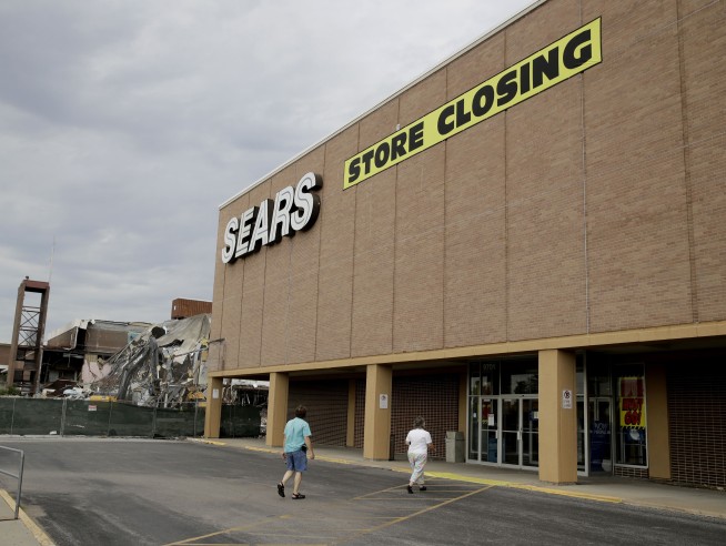 Sears files for Chapter 11 amid plunging sales, massive debt