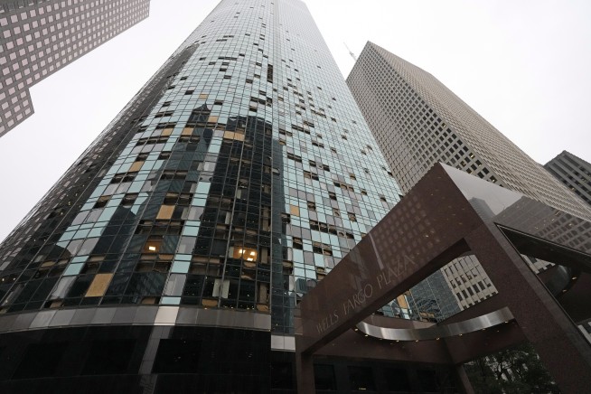 Some in Houston facing no power for weeks after storms cause widespread damage, killing at least 4