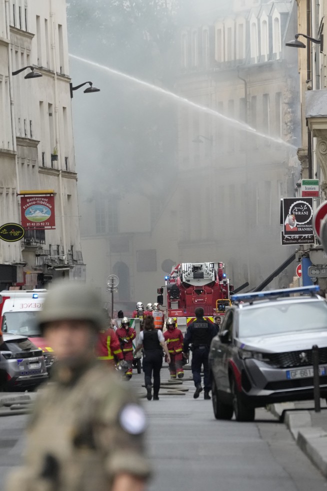 Paris police look at gas leak as possible cause of explosion and fire that injured 24