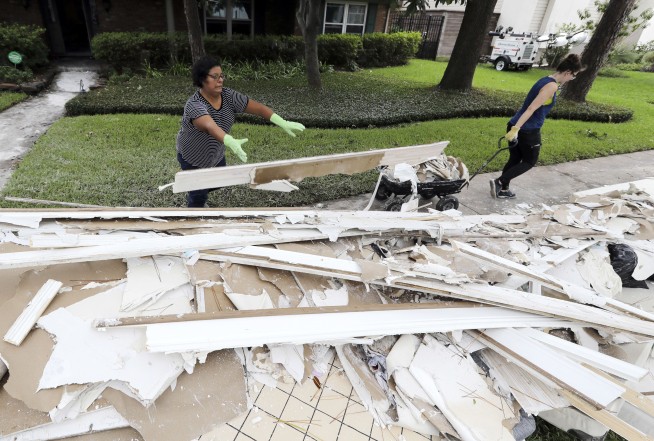 Houston-area floodwaters recede but dangers still loom